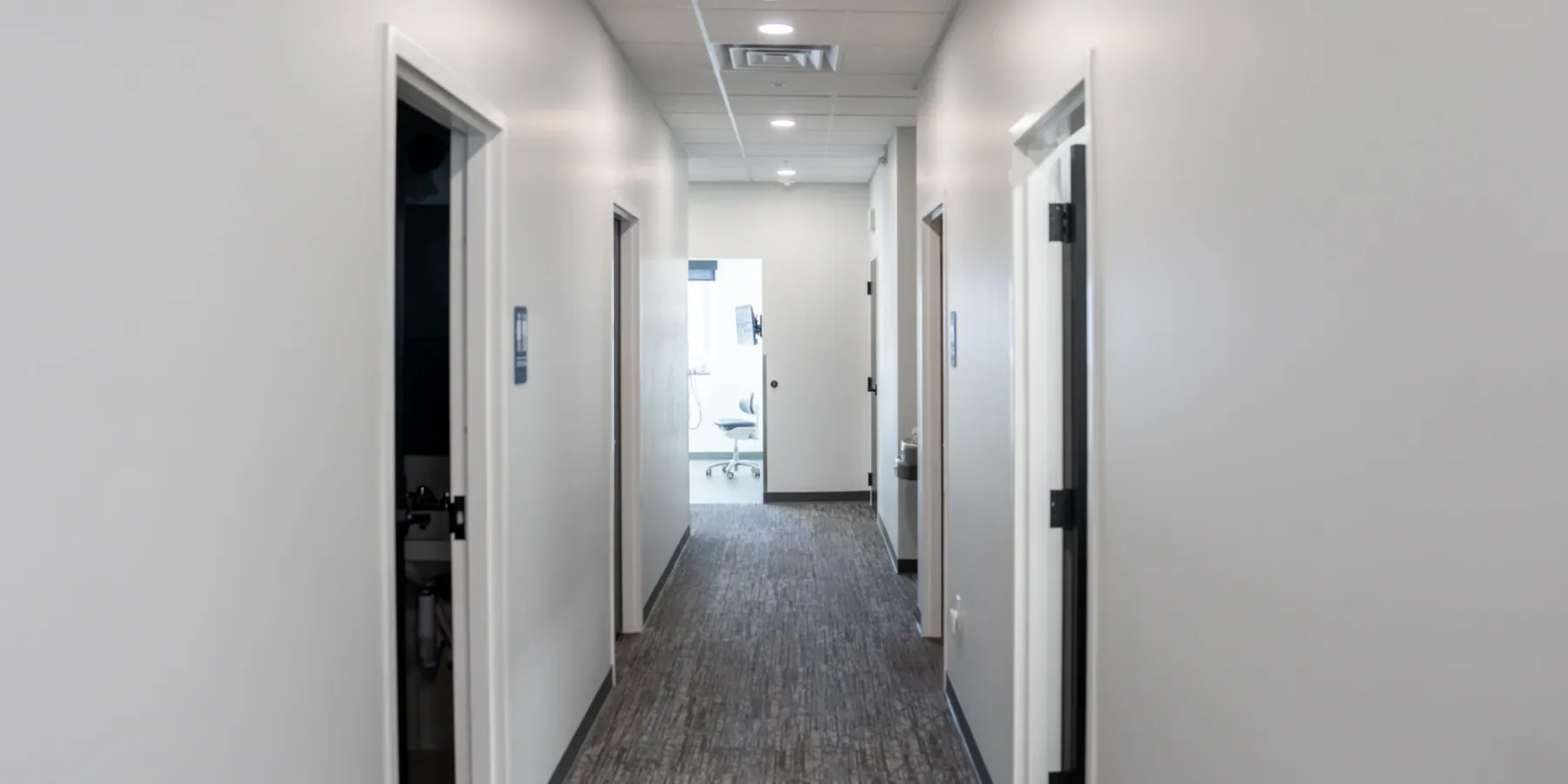 Bright hallway leading to the Mountain View treatment rooms | Complete Smiles-Cottonwood Heights-Mountain View-Redwood-Utah
