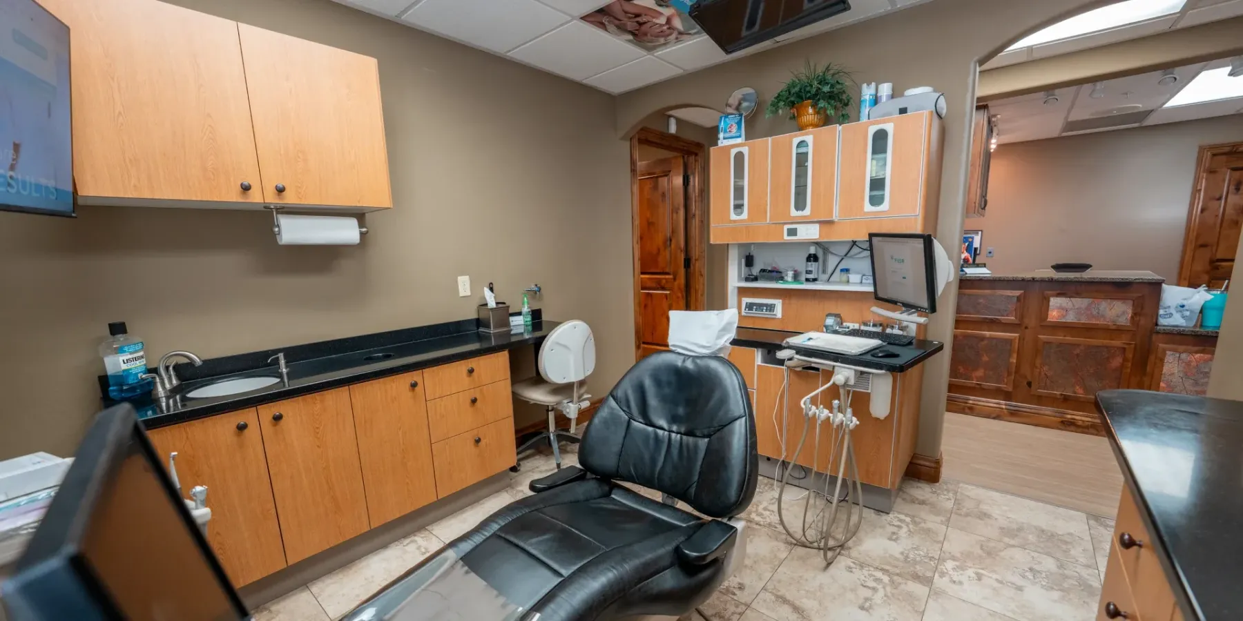 Redwood treatment room with a dental chair beside a shuttered window | Complete Smiles-Cottonwood Heights-Mountain View-Redwood-Utah