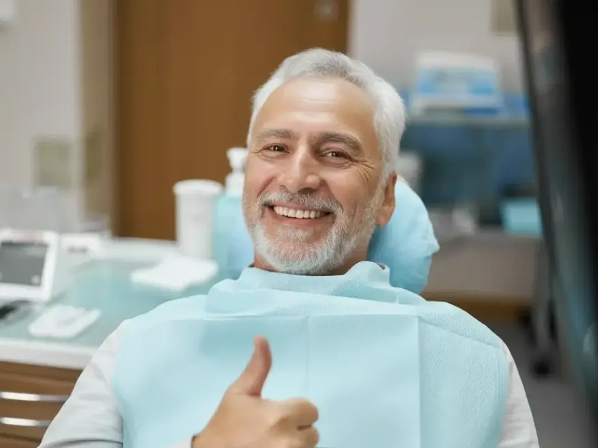 A smiling older man at home after full-arch treatment | Complete Smiles-Cottonwood Heights-Mountain View-Redwood-Utah