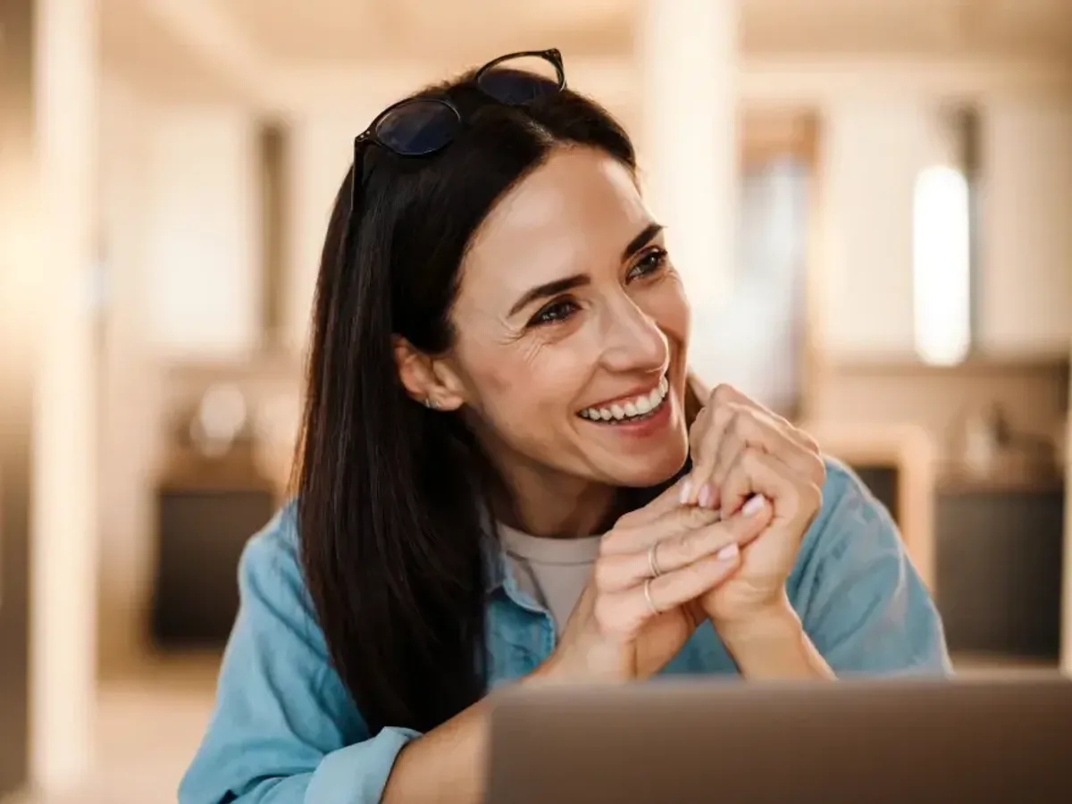 A woman smiling after having a damaged tooth restored | Complete Smiles-Cottonwood Heights-Mountain View-Redwood-Utah